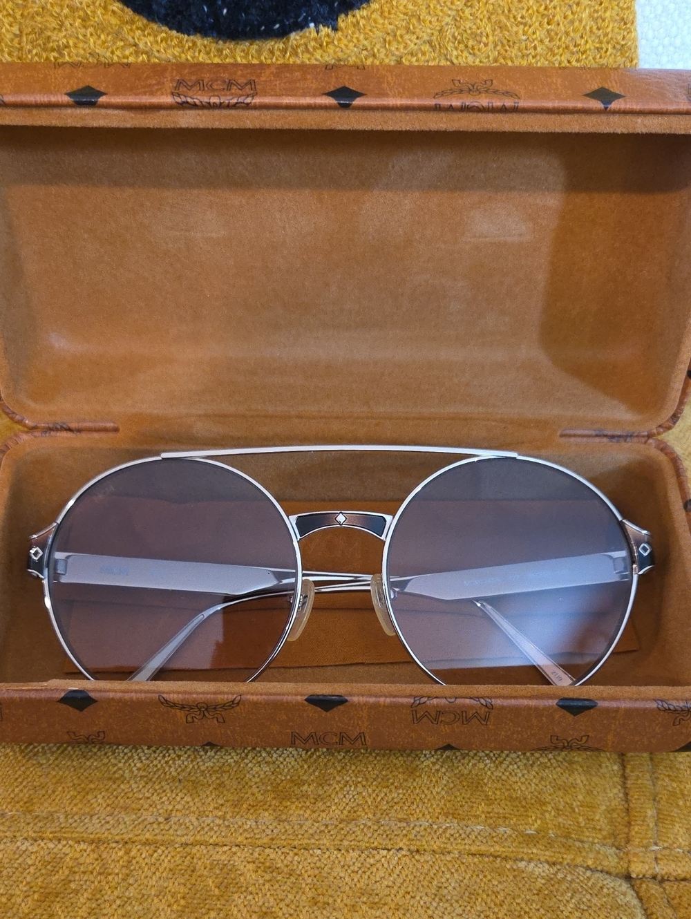 MCM Silver Frame Sunglasses with Round Lenses